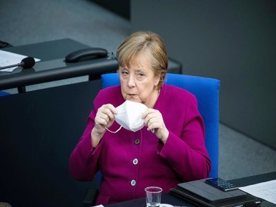 Angela Merkel au Bundestag à Berlin, le 25 mars 2021, avant le sommet européen - STEFANIE LOOS [AFP]