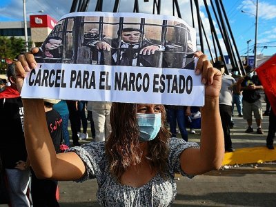 Manifestation contre le président hondurien Juan Orlando Hernandez, le 30 mars 2021 à Tegucigalpa - Orlando SIERRA [AFP]