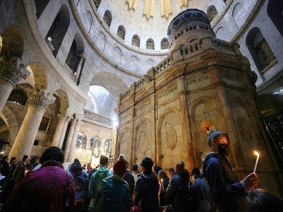 Messe de Pâques dans l'église du Saint Sépulcre, à Jérusalem, le 3 avril 2021 - Emmanuel DUNAND [AFP]