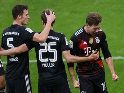 Leon Goretzka (d), buteur pour le Bayern à Leipzig, le 3 avril 2021 - ALEXANDER HASSENSTEIN [POOL/AFP]