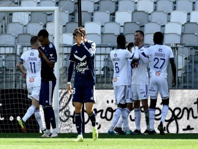 La joie des Strasbourgeois sur le 3e but marqué par Ludovic Ajorque (2e à droite) contre une équipe de Bordeaux sonnée à domicile, le 4 avril 2021 - Philippe LOPEZ [AFP]