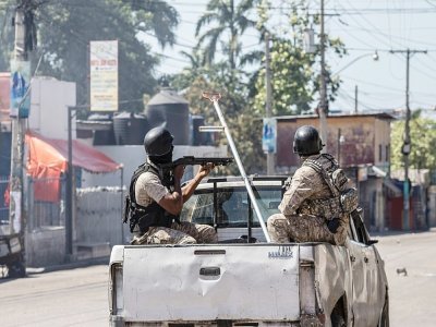 Des policiers dans une rue de Port-au-Prince, le 10 février 2021 à Haïti - Valerie Baeriswyl [AFP]
