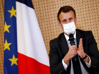 Emmanuel Macron à Reims le 14 avril 2021 - CHRISTIAN HARTMANN [POOL/AFP/Archives]