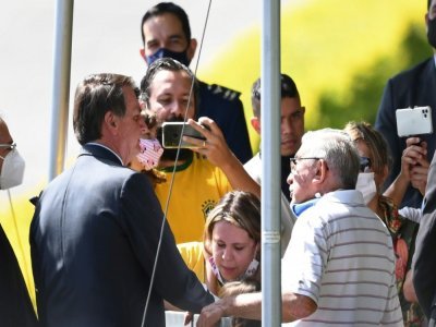 Le président brésilien Jair Bolsonaro quittant sa résidence officielle le 27 avril 2021 à Brasilia - EVARISTO SA [AFP]