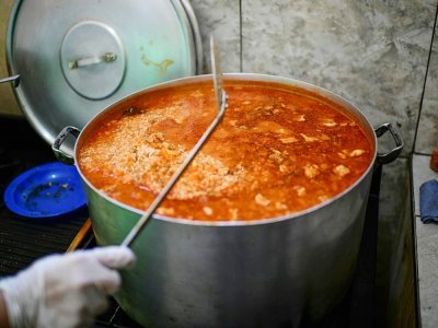 Les cuisines d'une soupe populaire du quartier Puerta de Hierro, à La Matanza, banlieue pauvre de Buenos Aires, le 12 avril 2021 - Ronaldo SCHEMIDT [AFP]