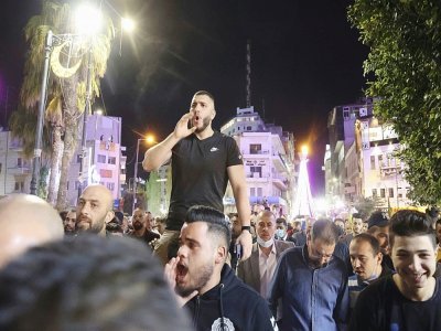 Des Palestiniens manifestent contre tout report des élections, à Ramallah, le 29 avril 2021 - ABBAS MOMANI [AFP]