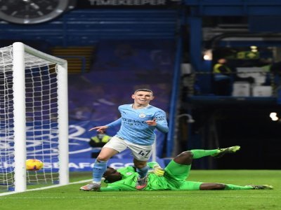 Le jeune milieu de Manchester City Phil Foden buteur contre Chelsea à Stamford Bridge, le 3 janvier 2021 - Andy Rain [POOL/AFP/Archives]