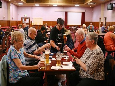 Pubs et stades rouvrent au Royaume-Uni - Oli SCARFF [AFP]