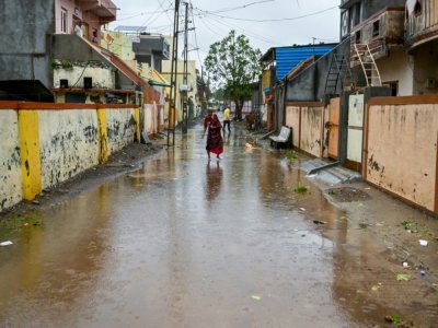 Une rue inondée après le passage du cyclone Tauktea, le 18 mai 2021 à Amreli, en Inde - Punit PARANJPE [AFP]