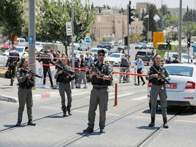 Les forces de l'ordre israéliennes bouclent la zone d'une attaque au couteau à Jérusalem, le 24 mai 2021 - Ahmad GHARABLI [AFP]