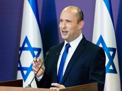 Le chef du parti de la droite radicale israélienne Yamina, Naftali Bennett, s'exprime au Parlement à Jérusalem, le 30 mai 2021 - YONATAN SINDEL [POOL/AFP]