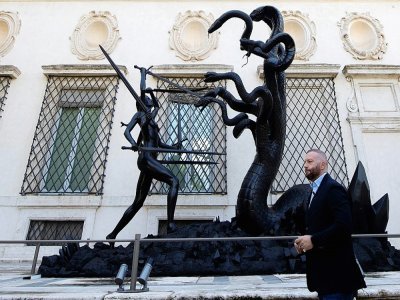 Hirst's 'Hydra and Kali' sculpture stands outside the Borghese gallery - Tiziana FABI [AFP]