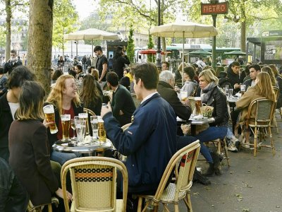 Une terrasse de café à Paris, le 19 mai 2021 - Bertrand GUAY [AFP]