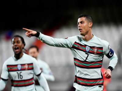 La joie de l'attaquant portugais Cristiano Ronaldo, après un but marqué contre le Luxembourg, lors des éliminatoires de la Coupe du monde 2022 au Qatar, le 30 mars 2021 à Luxembourg - JOHN THYS [AFP/Archives]