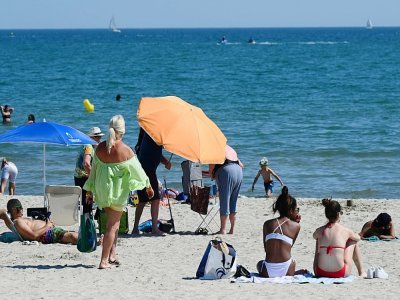 Une plage ouverte aux touristes à Palavas-les-Flots, le 10 juin 2021, après l'allègement des restrictions contre le Covid-19 en France - Pascal GUYOT [AFP]