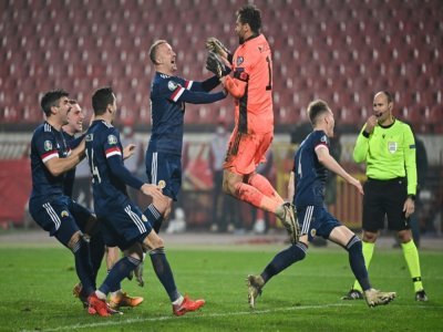 La joie des Ecossais après leur qualification pour l'Euro 2020 aux dépens de la Serbie, lors de leur match de play-off, le 12 novembre 2020 à Belgrade - ANDREJ ISAKOVIC [AFP/Archives]