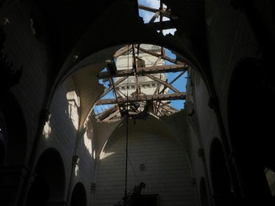 L'église de Saint Nicolas de Bourgueil dont le clocher est tombé dans la nef après le passage d'une tornade, le 19 juin 2021 en Indre-et-Loire - Guillaume SOUVANT [AFP]