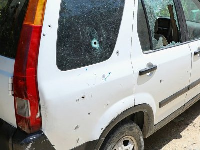 Des impacts de balles sur une voiture en dehors du Palais présidentiel haïtien, à Port-au-Prince, le 7 juillet 2021 - VALERIE BAERISWYL [AFP]