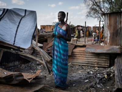 Une femme sur un marché incendié de Gumuruk, au Sud-Soudan, le 10 juin 2021 - Simon Wohlfahrt [AFP/Archives]