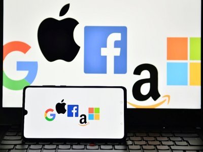 Photo des logos de Google, Apple, Facebook, Amazon et Microsoft, prise le 18 décembre 2020 à Londres - JUSTIN TALLIS [AFP/Archives]