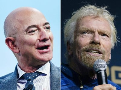 Le fondateur de Blue Origin, Jeff Bezos (à gauche) et le fondateur de Virgin Galactic, Richard Branson - MANDEL NGAN, Don EMMERT [AFP/Archives]