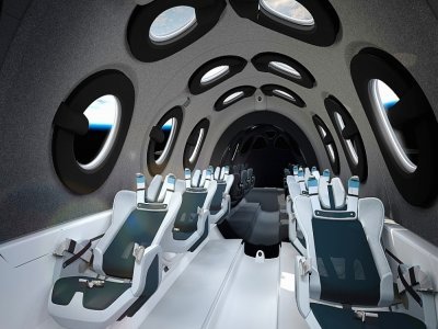 L'intérieur du vaisseau de Virgin Galactic, qui peut accueillir jusqu'à six passagers pour aller flotter quelques minutes en apesanteur dans l'espace - Handout [Virgin Galactic/AFP]