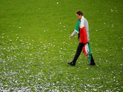 Le sélectionneur italien Roberto Mancini sur la pelouse de Wembley après la victoire en finale de l'Euro le 11 juillet 2021 - JOHN SIBLEY [POOL/AFP]