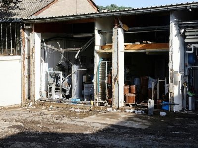 L'usine du chocolatier Galler endommagée par les inondations, le 17 juillet 2021 à Vaux-sous-Chèvremont, en Belgique - François WALSCHAERTS [AFP]