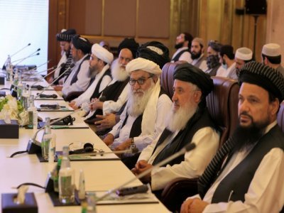 La délégation des talibans aux pourparlers avec des représentants du gouvernement afghan le 18 juillet 2021 à Doha - KARIM JAAFAR [AFP]