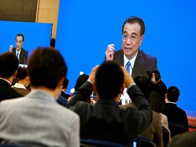 Le Premier ministre Li Keqiang lors d'une conférence de presse virtuelle, au Grand Palais du Peuple à Pékin le 11 mars 2021, à l'occasion de la clôture de l'Assemblée nationale populaire - Noel Celis [AFP/Archives]