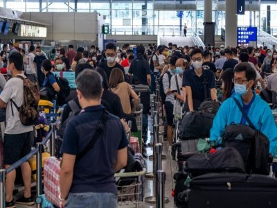 L'aéroport de Hong Kong avant un vol pour le Royaume-Uni le 19 juillet 2021 - Bertha WANG [AFP]