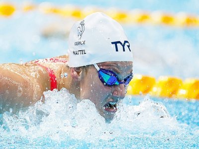 La nageuse française Marie Wattel lors des demi-finales du 100 m papillon des Jeux olympiques de Tokyo le 25 juillet 2021 - Odd ANDERSEN [AFP]