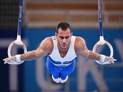 Le Français Samir Ait Said lors de l'épreuve des anneaux en gymnastique artistique lors des Jeux olympiques de Tokyo à l'Ariake Gymnastics Centre le 24 juillet 2021 - Lionel BONAVENTURE [AFP/Archives]