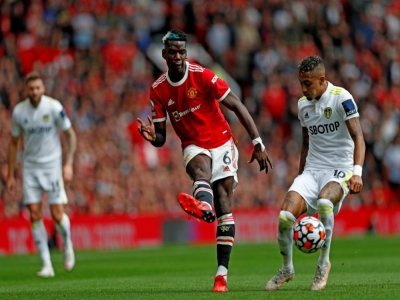 Le milieu de terrain français de Manchester United, Paul Pogba, lors du match contre Leeds comptant pour la 1ère journée de la Premier League, le 14 août 2021 à Old Trafford - Adrian DENNIS [AFP]
