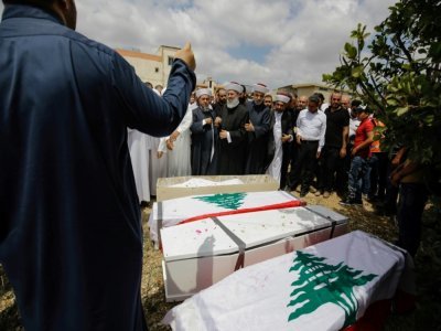 Les funérailles de victimes de l'explosion d'une citerne d'essence, le 18 août 2021 à al-Daouseb, dans la région du Akkar, au Liban - Ibrahim Chalhoub [AFP]