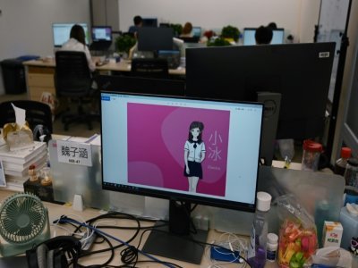 L'écran d'accueil du site de XiaoIce dans les locaux de la société, le 5 juillet 2021 à Pékin - GREG BAKER [AFP]