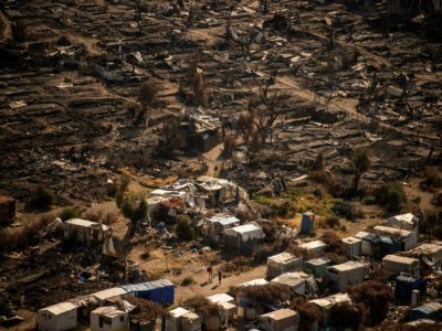 Vue du camp incendié de Moria, sur l'île de Lesbos (Grèce), le 16 septembre 2020 - ANGELOS TZORTZINIS [AFP/Archives]
