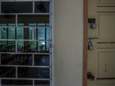 Une classe vide et fermée dans une école de Manille, le 8 septembre 2021 à Manille, aux Philippines - Jam STA ROSA [AFP]