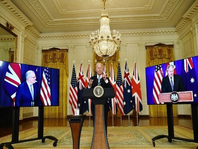 Le président américain Joe Bide participe à une visioconférence avec les Premiers ministres australien Scott Morrisson et britannique Boris Johnson, le 15 septembre 2021 à la Maison Blanche - Brendan Smialowski [AFP]