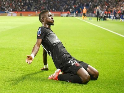Idrissa Gueye célèbre son but contre Montpellier lors du succès du PSG 2-0 au Parc des Princes, le 25 septembre 2021 - FRANCK FIFE [AFP/Archives]