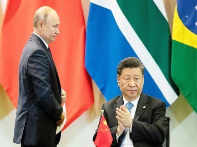 Les présidents russe Vladimir Poutine (g) et chinois Xi Jinping à Brasilia, le 14 novembre 2019 - Pavel Golovkin [POOL/AFP/Archives]