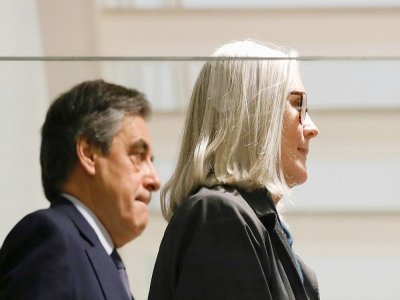 L'ancien Premier ministre François Fillon et son épouse Penelope le 10 mars 2020 au tribunal de Paris - Thomas SAMSON [AFP/Archives]