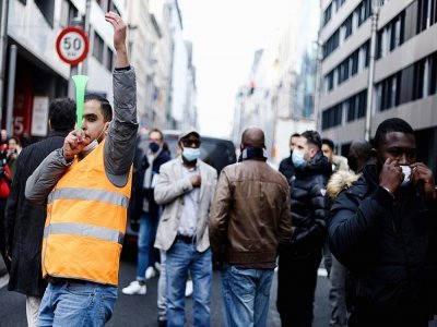Chauffeurs Uber manifestant à Bruxelles le 25 novembre 2021 - Kenzo TRIBOUILLARD [AFP]