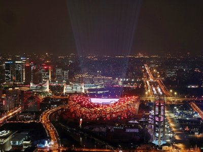 Le stade national de Pékin illuminé, le 19 janvier 2022 - Leo RAMIREZ [AFP/Archives]