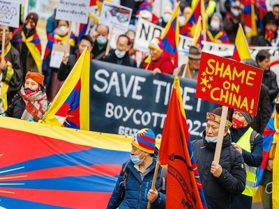 DesTibétains manifestent contre la tenue des JO d'hiver à Pékin, le 3 février 2022 à Lausanne, en Suisse - VALENTIN FLAURAUD [AFP]