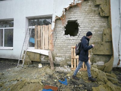 Dans le village de Stanitsa Louganska, dans l'est de l'Ukraine, après un bombardement par les séparatistes pro-russes le 18 février 2022 - Aleksey Filippov [AFP]