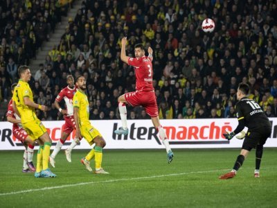 Le défenseur chilien de Monaco Guillermo Maripan ouvre le score face à Nantes, en demi-finale de la Coupe de France, le 2 mars 2022 au Stade de La Beaujoire - LOIC VENANCE [AFP]