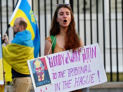 Des personnes manifestent leur soutien à l'Ukraine devant la Maison Blanche, à Washington le 15 mars 2022 - Nicholas Kamm [AFP]