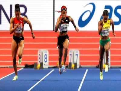 La Suissesse Mujinga Kambundji, la Trinidadienne Michelle-Lee Ahye et la Jamaïcaine Briana Williamsen finale du 60m à Belgrade, le 18 mars 2022 - Pedja Milosavljevic [AFP]
