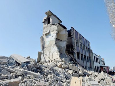 Une école détruite par un bombardement russe, le 23 mars 2022 à Kharkiv, en Ukraine - Sergey BOBOK [AFP]